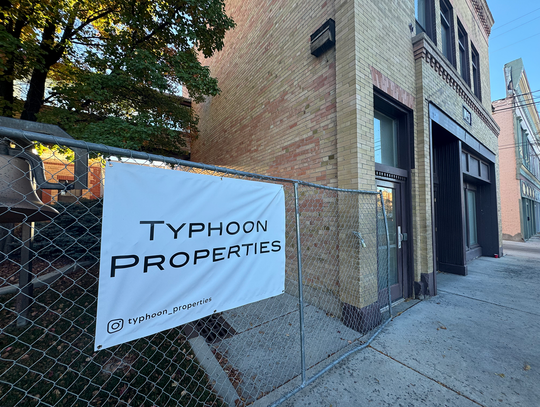 A sign for Typhoon Properties downtown, next to the former City Hall and Fire Station No. 1 buildings. Typhoon Group is a Hong Kong-based holdings company that has already invested heavily in Montrose. A boutique hotel at this location will be one of the company's next projects.